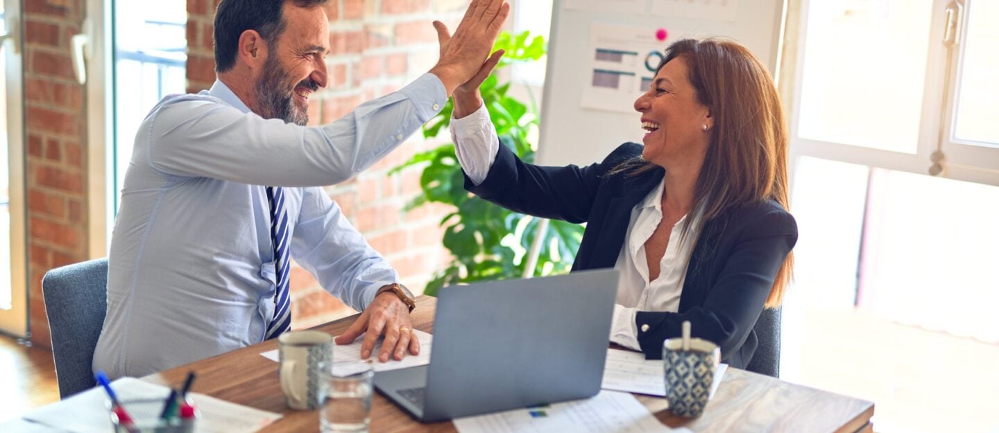 business people clap their hands